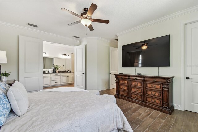 8307 Bluevine Sky Dr, Land O Lakes, FL 34637 - bedroom featuring wood tiled floors, ornamental molding, baseboards, ensuite bath, and ceiling fan