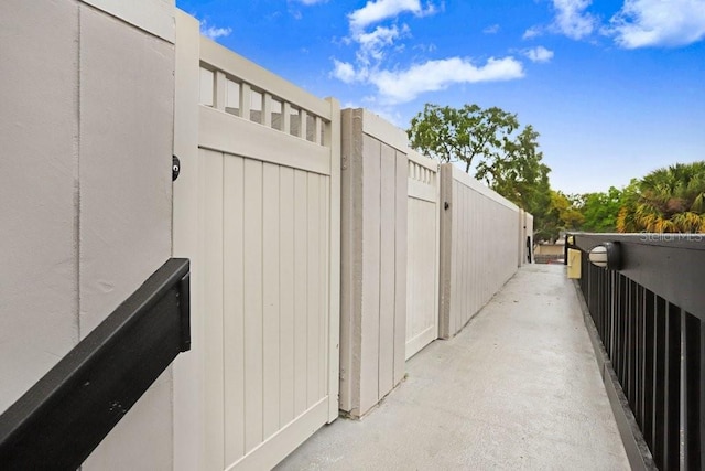 view of gate featuring fence