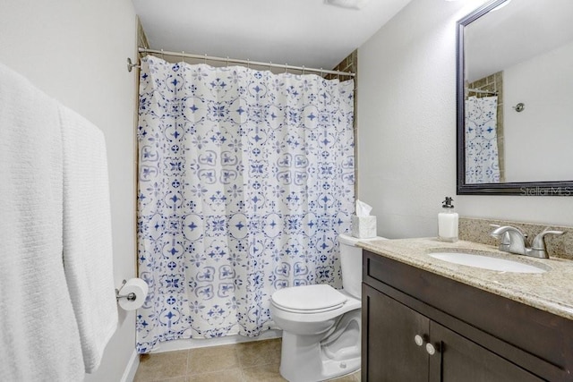 bathroom featuring tile patterned floors, toilet, vanity, and a shower with curtain