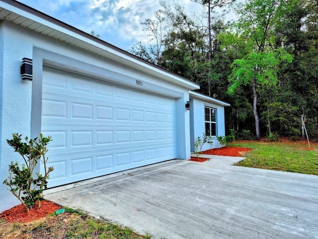 garage with driveway