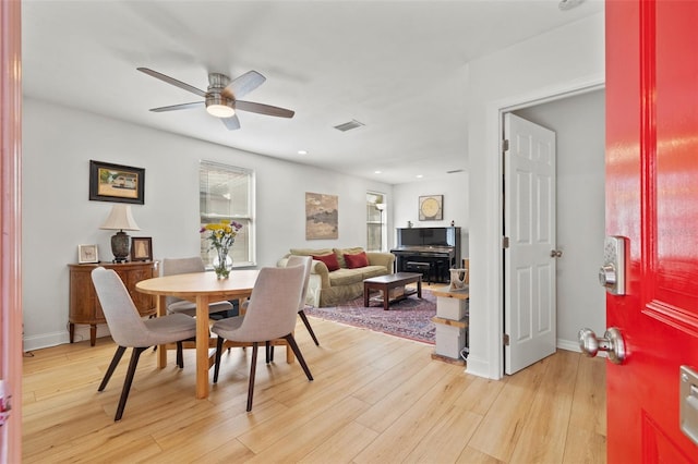 dining room with baseboards, visible vents, light wood finished floors, recessed lighting, and ceiling fan