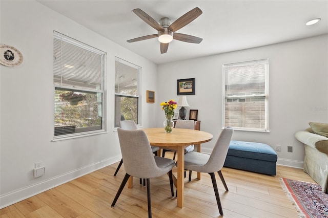 dining space with recessed lighting, ceiling fan, light wood-type flooring, and baseboards