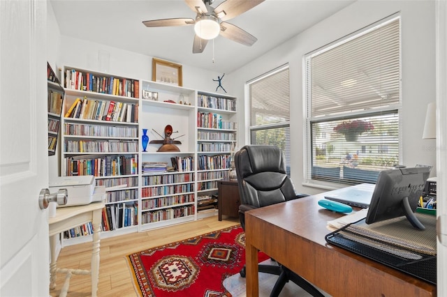 office with ceiling fan and wood finished floors