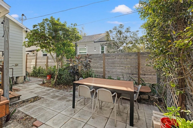 view of patio / terrace featuring outdoor dining area and a fenced backyard