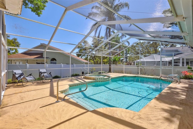 view of pool featuring a patio area, a fenced in pool, an in ground hot tub, and glass enclosure