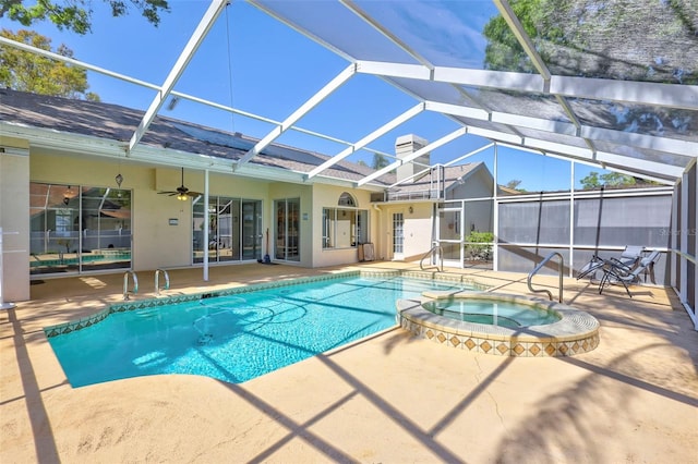 view of pool with a lanai, a ceiling fan, and a patio