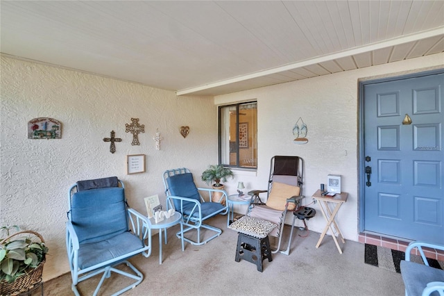 property entrance featuring stucco siding