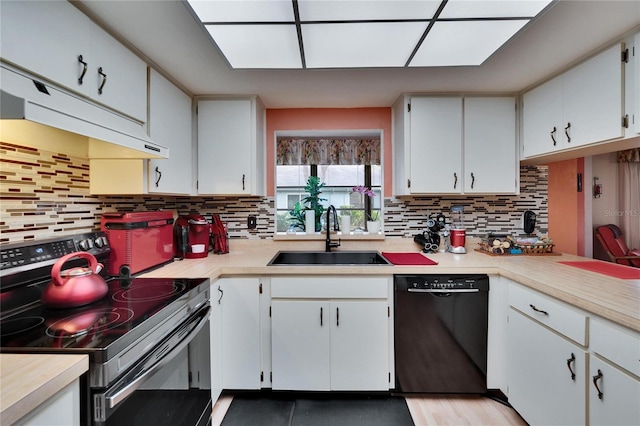 kitchen with electric stove, a sink, under cabinet range hood, black dishwasher, and light countertops