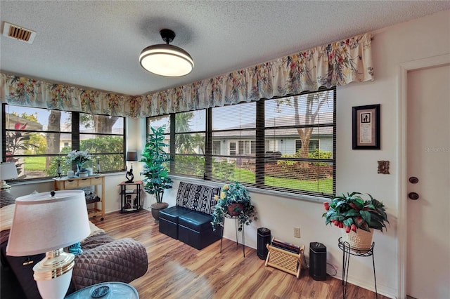 interior space with plenty of natural light and visible vents