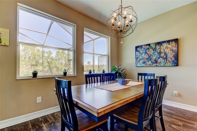 dining room with an inviting chandelier, baseboards, and dark wood-style flooring