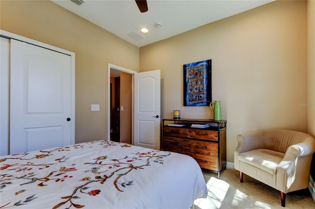 bedroom with visible vents, ceiling fan, light colored carpet, recessed lighting, and a closet