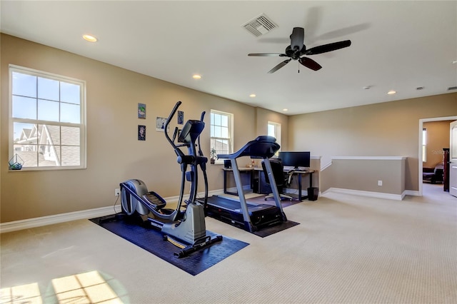 exercise room featuring baseboards, recessed lighting, visible vents, and light carpet