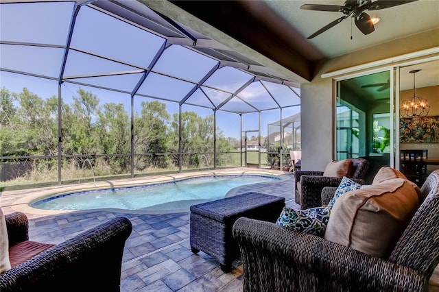 outdoor pool with a patio area, an outdoor living space, a lanai, and ceiling fan