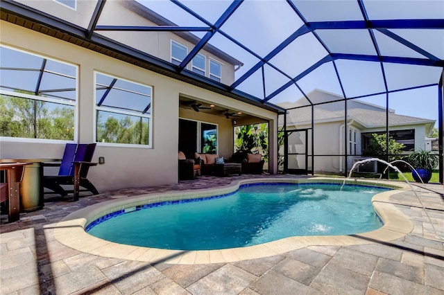 outdoor pool featuring a lanai, ceiling fan, outdoor lounge area, and a patio