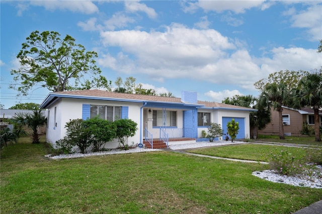 single story home with a front yard, covered porch, stucco siding, a chimney, and an attached garage