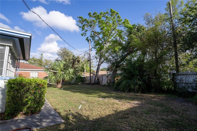 view of yard featuring fence