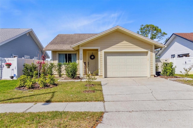 ranch-style home with a front yard, fence, a garage, and driveway