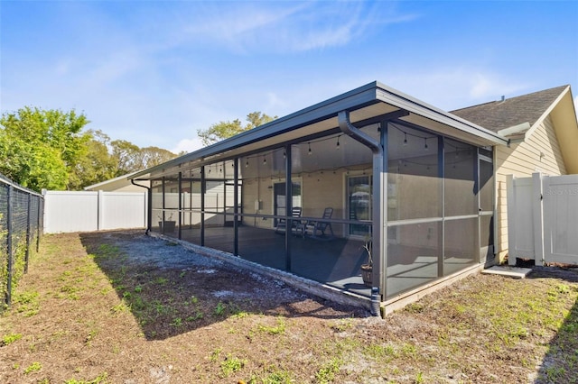 exterior space featuring a fenced backyard