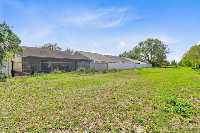 view of yard with fence