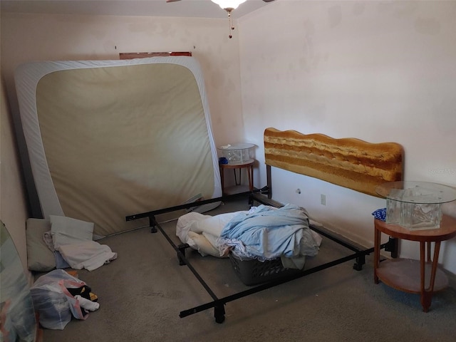 carpeted bedroom featuring a ceiling fan