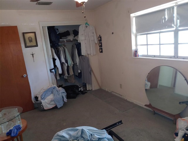 bedroom featuring visible vents and a closet