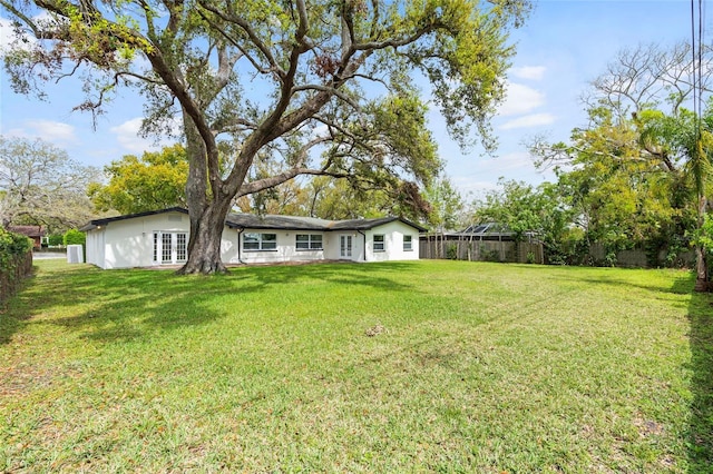 view of yard with fence