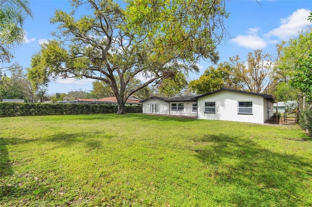 view of yard featuring fence