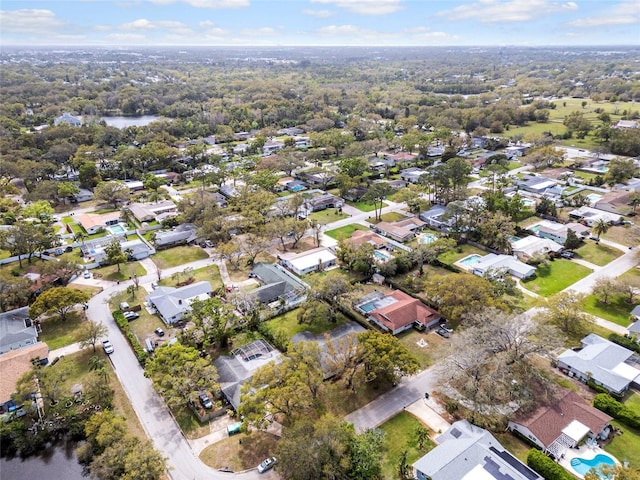 aerial view featuring a residential view and a water view