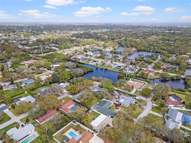 bird's eye view with a residential view and a water view