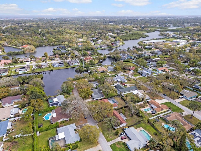 birds eye view of property featuring a residential view and a water view