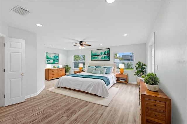 bedroom with baseboards, visible vents, recessed lighting, ceiling fan, and light wood-type flooring