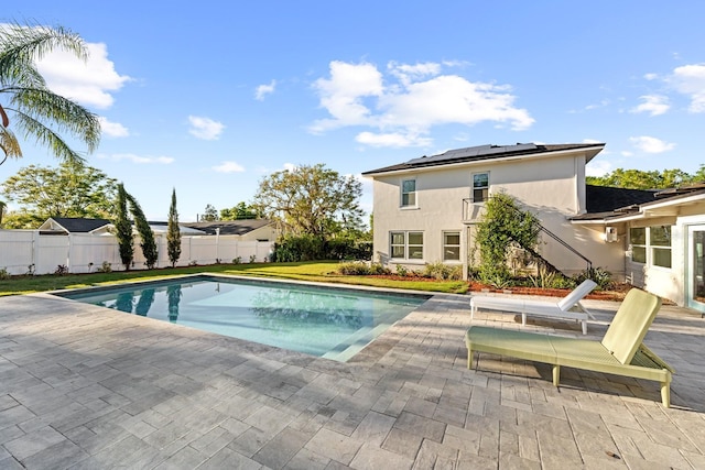 view of swimming pool featuring a fenced backyard, a patio, and a fenced in pool