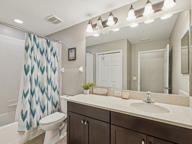 full bathroom featuring vanity, visible vents, shower / tub combo, a textured ceiling, and toilet