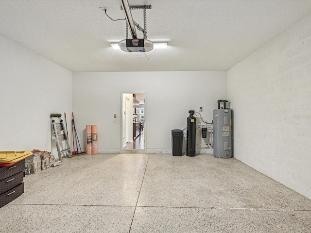 garage with a garage door opener and electric water heater