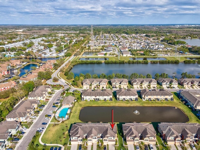 aerial view with a residential view and a water view