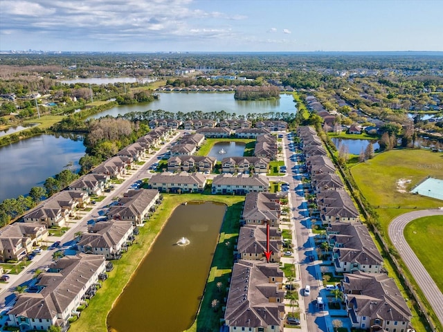 birds eye view of property featuring a residential view and a water view