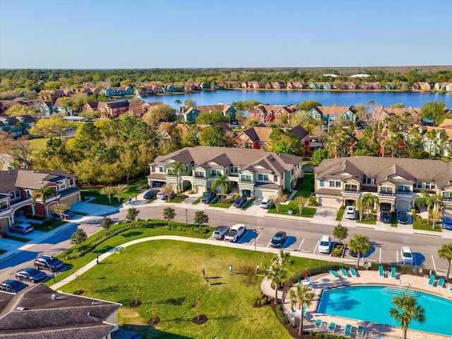 aerial view featuring a water view and a residential view