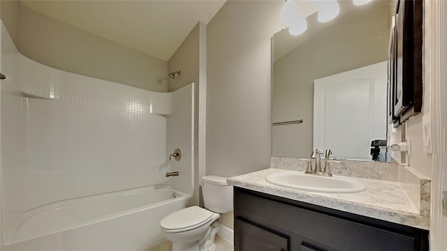 bathroom with shower / bathtub combination, toilet, and vanity