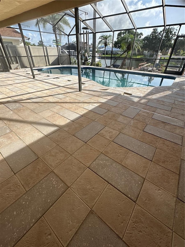 727 Flamingo Dr, Apollo Beach, FL 33572 - swimming pool with a patio area and glass enclosure