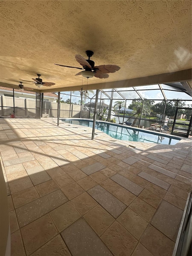 727 Flamingo Dr, Apollo Beach, FL 33572 - swimming pool featuring a ceiling fan, a patio, and a lanai