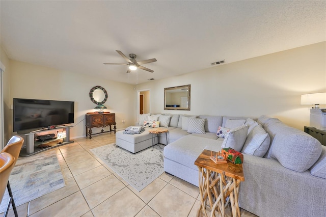 727 Flamingo Dr, Apollo Beach, FL 33572 - living room with light tile patterned floors and ceiling fan