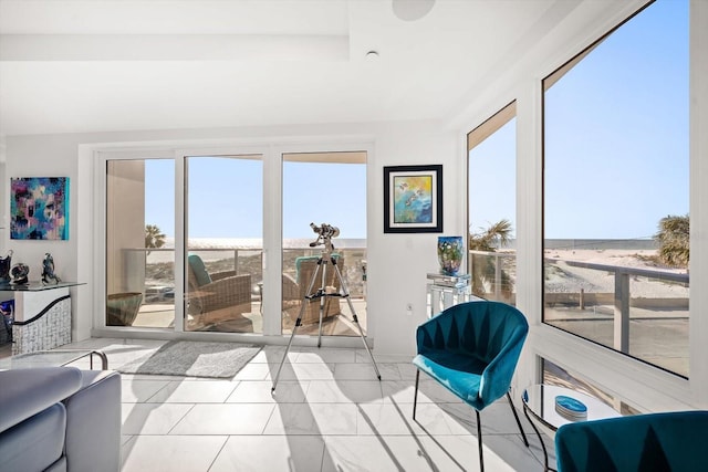 sunroom featuring a wealth of natural light