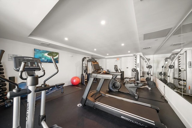 gym featuring recessed lighting and visible vents