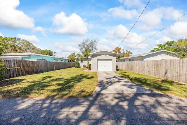 exterior space with concrete driveway and fence