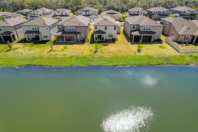 aerial view featuring a residential view and a water view