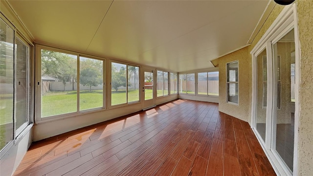 unfurnished sunroom with a healthy amount of sunlight