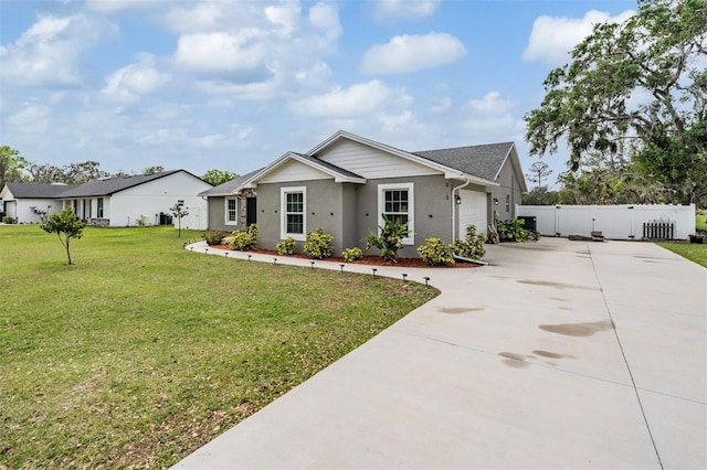 view of front of property with a front lawn, a gate, fence, concrete driveway, and an attached garage