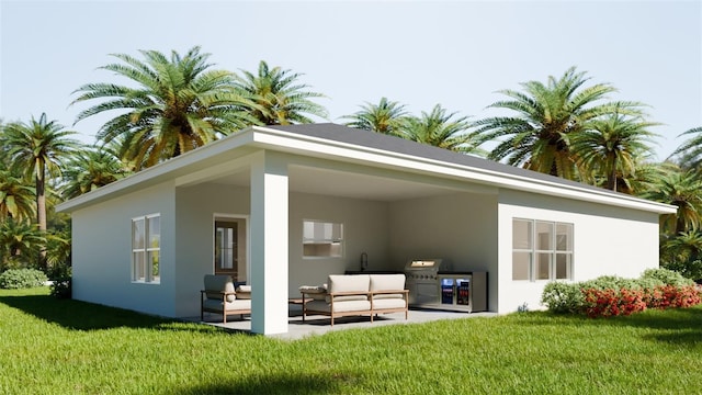 back of house with stucco siding, an outdoor hangout area, a lawn, and a patio