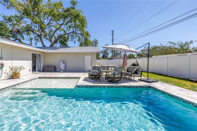 view of pool featuring a patio, a fenced backyard, a fenced in pool, and an outdoor hangout area