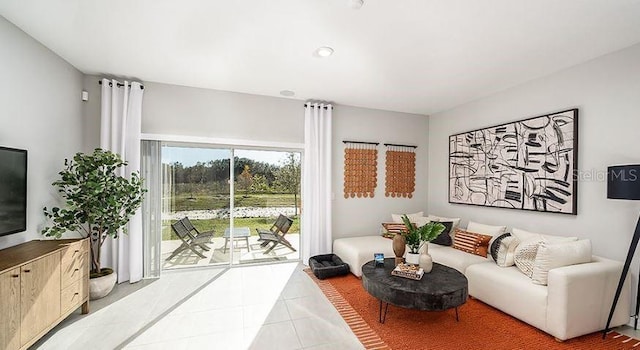 living area with light tile patterned flooring